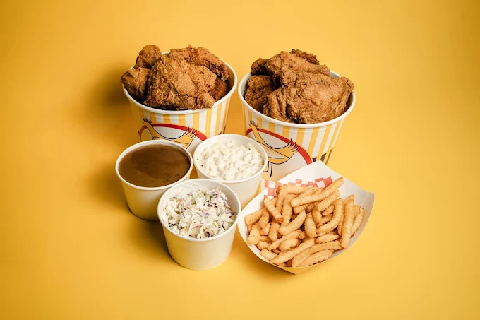 Crispy Chicken Wings with signature sauces at JoJo's Chicken Shack